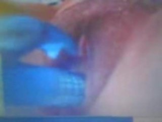 Skype young woman temptation using blue toy