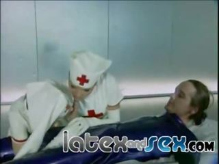 Latex nurses treat a rubber gas mask chap